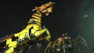 Robot dragon fights a giant spider in Chinese ceremony - CBBC Newsround