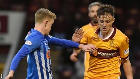 Ross MacLean (right) passed up a good chance for Motherwell in the first half