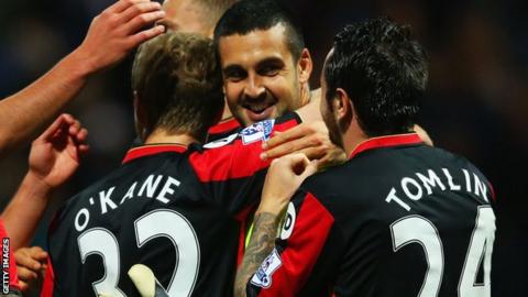 Adam Federici congratulated by Bournemouth team-mates