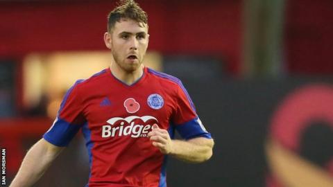 George Fowler in action for Aldershot Town