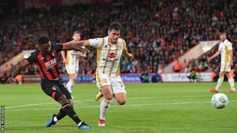 Jermain Defoe in action against MK Dons