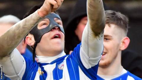 Brad Lyons of Coleraine celebrates his goal against Carrick Rangers