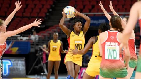 Suzy Drane marshalls the Wales defence to repel another Uganda attack
