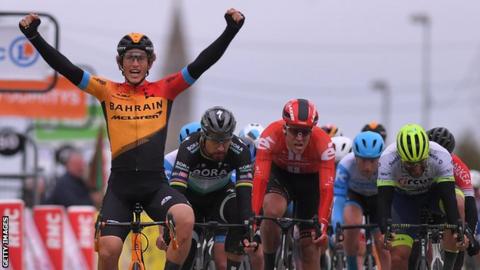 Spain's Ivan Garcia Cortina (left) raises his arms after holding off the pack to win stage three of Paris-Nice in a bunch sprint finish