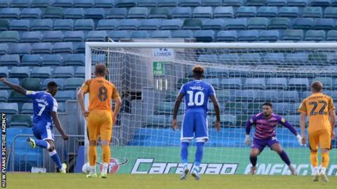 Gillingham's Brandon Hanlon scored his first penalty but saw his second saved by Nick Townsend