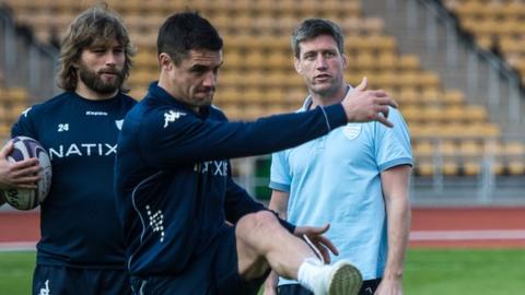 Ronan O'Gara (right) watched Dan Carter kicking during practice as Dimitri Swarovski looks on