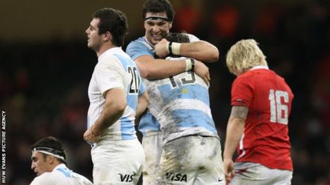 Argentina players celebrate victory over Wales in 2012