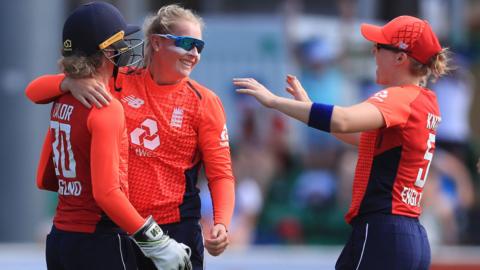 England's Sophie Ecclestone is congratulated