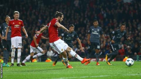 Daley Blind scores a penalty for Manchester United