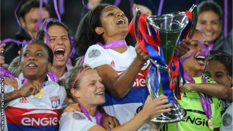 Olympique Lyonnais players with the Uefa Women's Champions League trophy