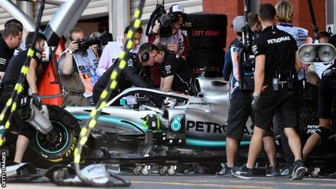 Hamilton goes back into the pits after problems early on in practice
