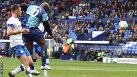 Adebayo Akinfenwa scores
