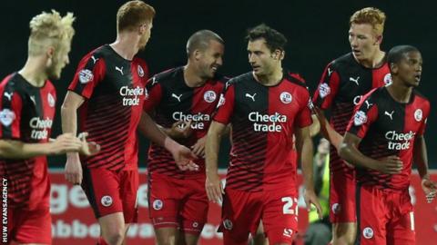 Crawley celebrate Gwion Edwards' first goal at Rodney Parade