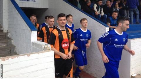 Huntly and Hawick Royal Albert emerge from the tunnel