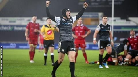 Ospreys fly-half Sam Davies celebrates their Pro14 derby win over Scarlets