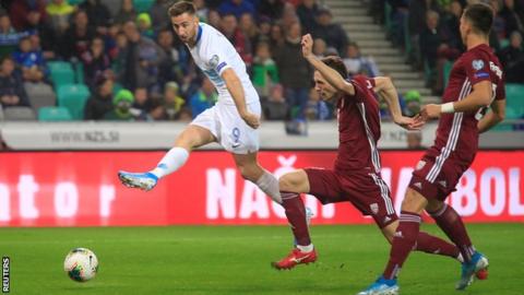 Andraz Sporar (left) in action for Slovenia