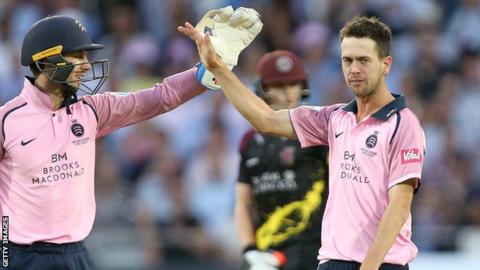 Nathan Sowter (right) celebrates taking a wicket