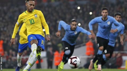 Neymar scores a penalty for Brazil