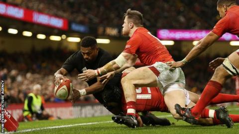 Waisake Naholo of New Zealand scores a try
