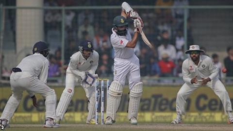 South Africa captain Hashim Amla defies the India bowlers