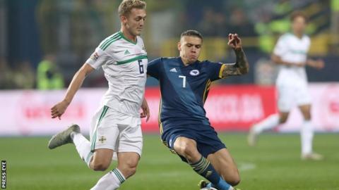 George Saville and Muhamed Besic vie for possession at Stadion Grbavica
