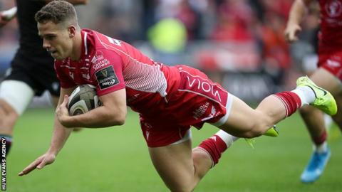Kieran Hardy goes over for Scarlets' first try