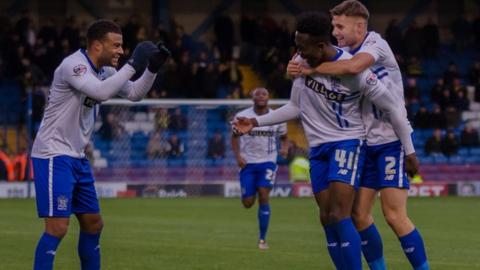 Bury celebrate what proved to be the matchwinner against Burton Albion at Gigg Lane