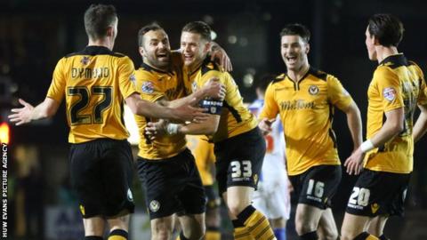 Newport County players celebrate Mark Byrne's goal against Blackburn Rovers