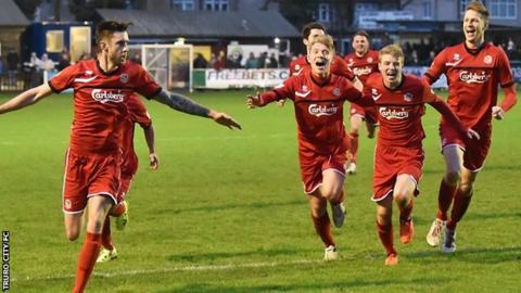 Ryan Brett celebrates after scoring Truro's equaliser with 33 seconds left