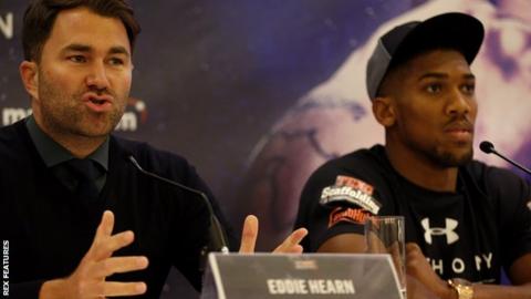 Anthony Joshua (right) with his promoter Eddie Hearn