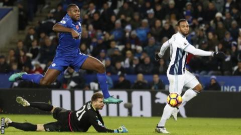 Matt Phillips (right) scores