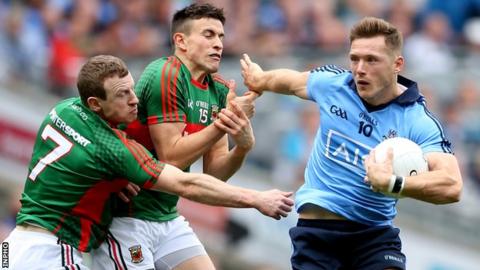 Dublin's Paul Flynn attempts to fend off Colm Boyle and Jason Doherty