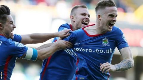 Aaron Burns celebrates scoring