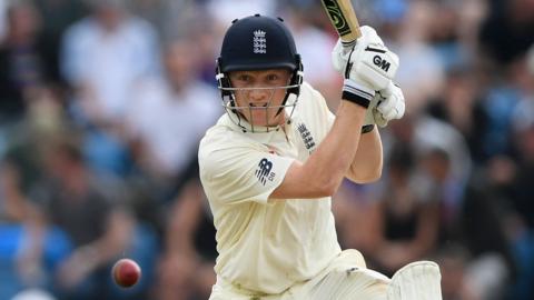 Dom Bess hits the ball