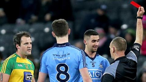 Referee Conor Lane issues a red card to Dublin's James McCarthy in Saturday's game at Croke Park