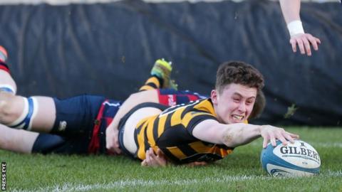 RBAI's Niall Armstrong stretches out to score his second try in the semi-final win over Ballymena Academy