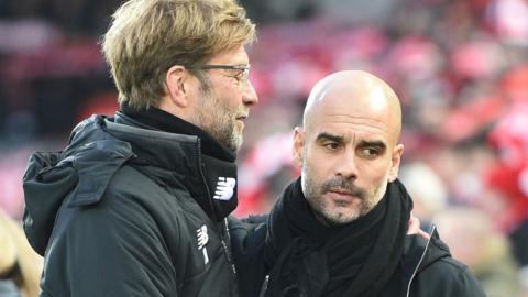 Manchester City manager Pep Guardiola (right) with Liverpool boss Jurgen Klopp