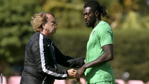 Togo coach Claude LeRoy and captain Emmanuel Adebayor