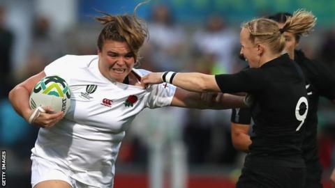 England prop Sarah Bern hands off New Zealand scrum-half Kendra Cocksedge