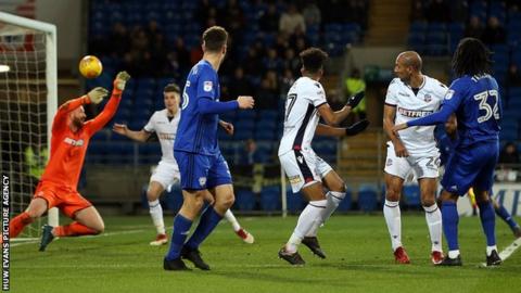 Armand Traore fires the ball past Ben Alnwick in the Bolton goal