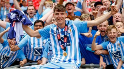 Tom Bayliss celebrates promotion with Coventry