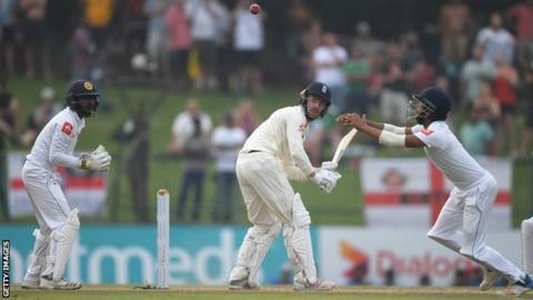England nightwatchman Jack Leach watches the ball after playing a shot against Sri Lanka
