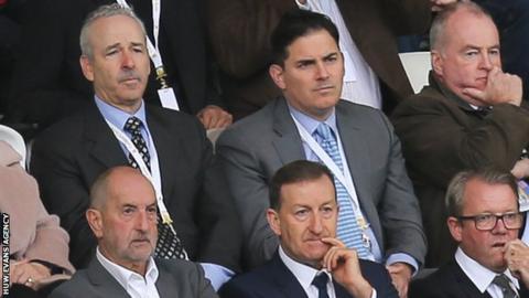 Huw Jenkins (front centre) seated in front of Stephen Kaplan and Jason Levien