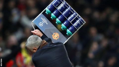 Manchester United manager Jose Mourinho throws a tray of water bottles to the floor after his side's winner against Young Boys in the Champions League