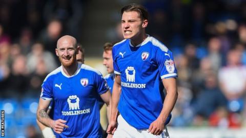 Chesterfield defender Sid Nelson celebrates scoring the opening goal against Notts County
