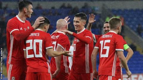 Wales players celebrate Dan James' goal against Belarus