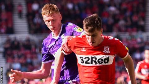 Sam Clucas of Stoke City and Paddy McNair of Middlesbrough
