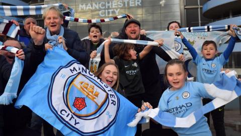 Manchester City fans celebrate