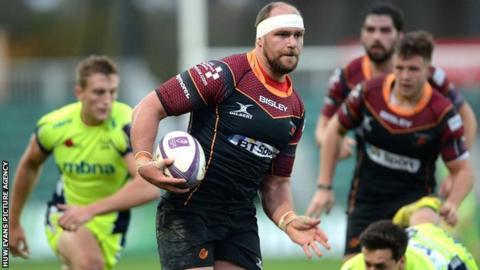 Dragons lock Rynard Landman