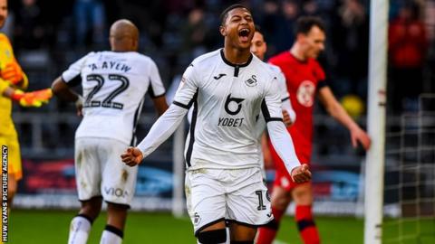 Rhian Brewster celebrates after scoring for Swansea